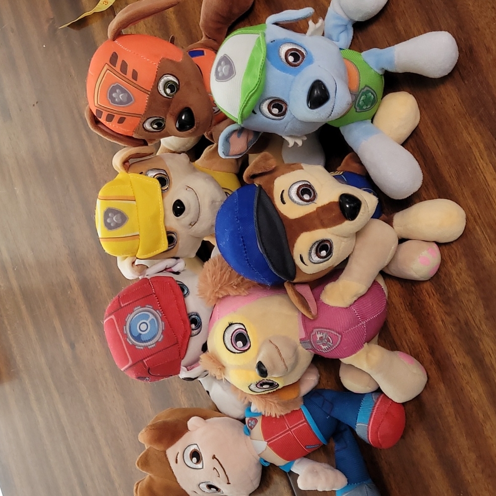 Paw Patrol stuffed animals.  7 of them